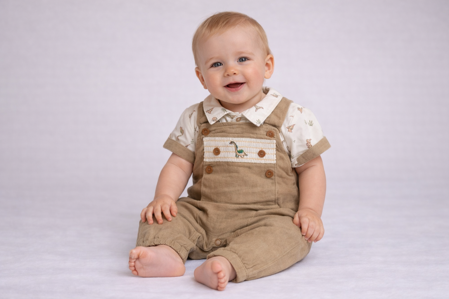 Smocked “Dinosaur” Linen Dungaree Set by My Little Chick (0–6 Months)