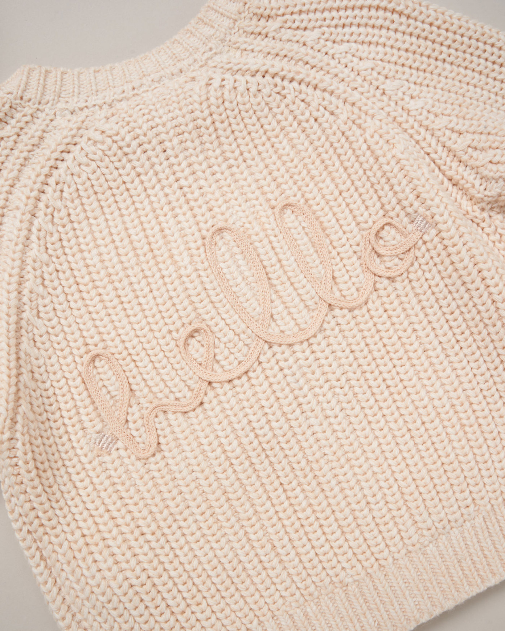 Cream “Hello” Knitted Cardigan (0–12 Months) by Rock a Bye Boutique - Image 2