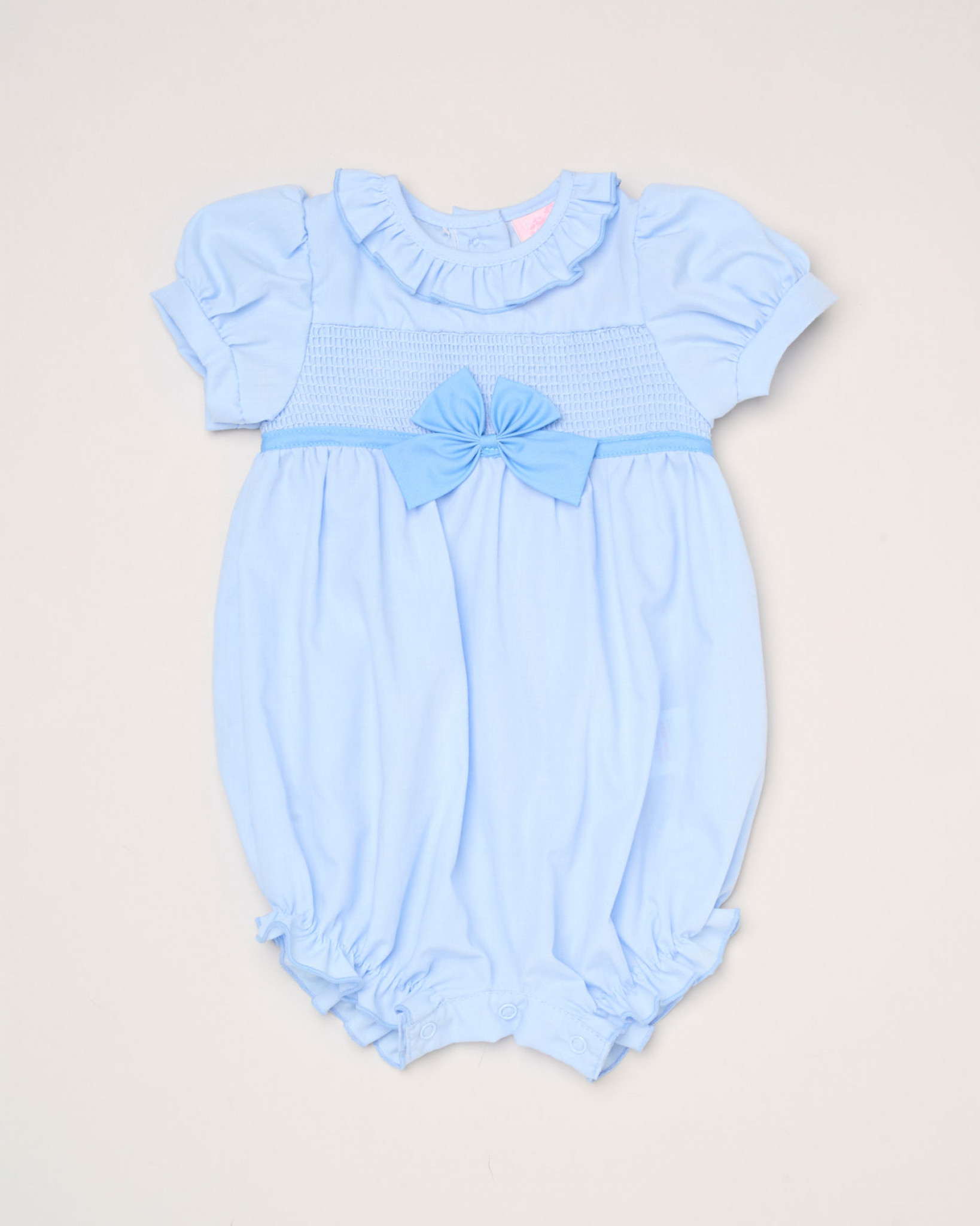 Bow and Smocked Romper – by Rock-a-Bye Boutique (0–6 months) - Image 5