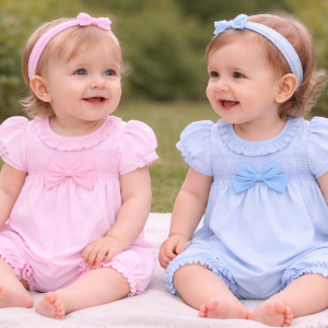 Bow and Smocked Romper – by Rock-a-Bye Boutique (0–6 months)