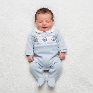 Sky Smocked “Lion” All In One – by Tiny Chick (3–8 lbs)