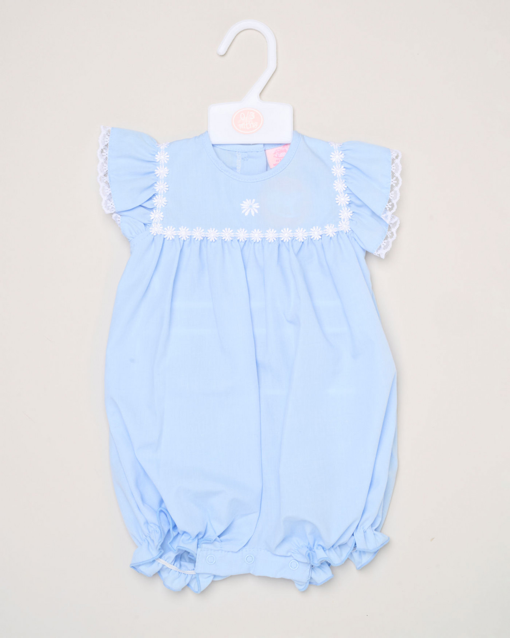 Blue or Pink Daisy Woven Romper – by Rock a Bye Boutique (0–9 months) - Image 3