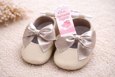 Beige Shiny Infant Shoes with Large Bow – by Soft Touch (0–12 months)